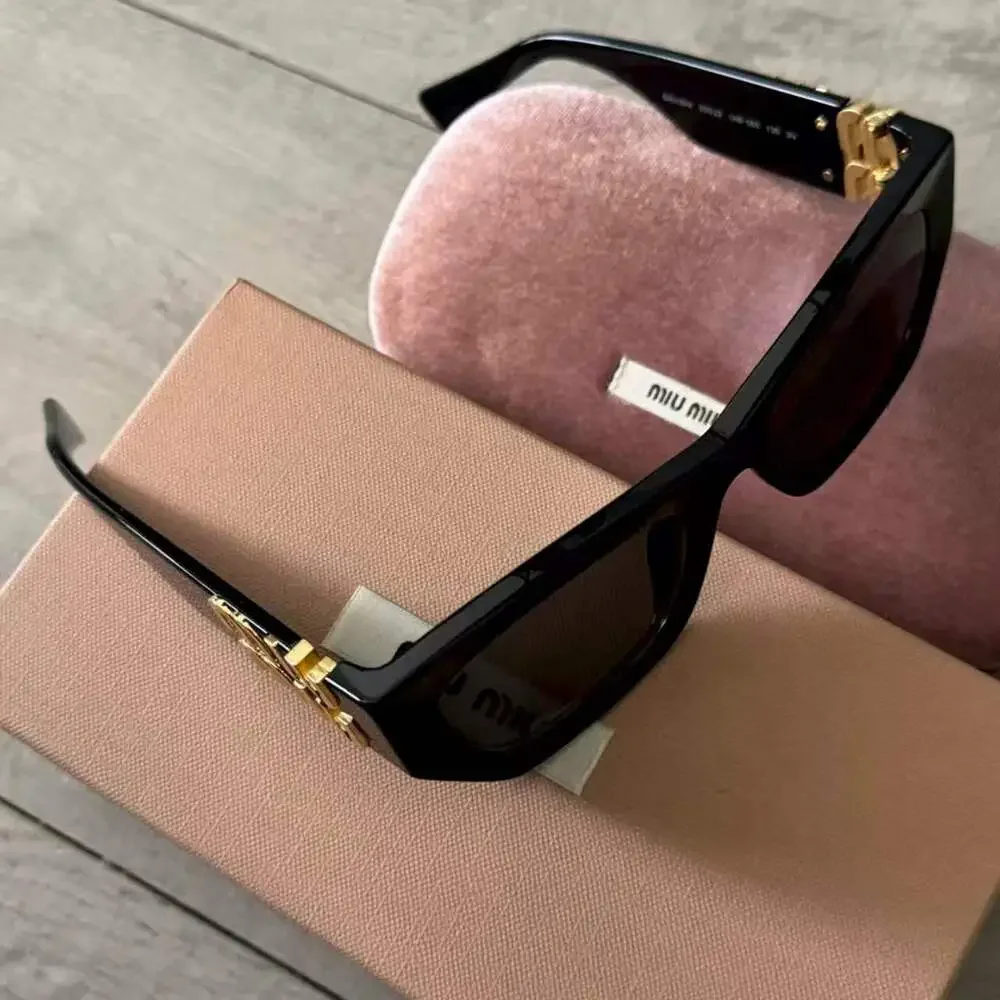 Miu Miu Glossy Black Cat Eye Acetate Sunglasses
